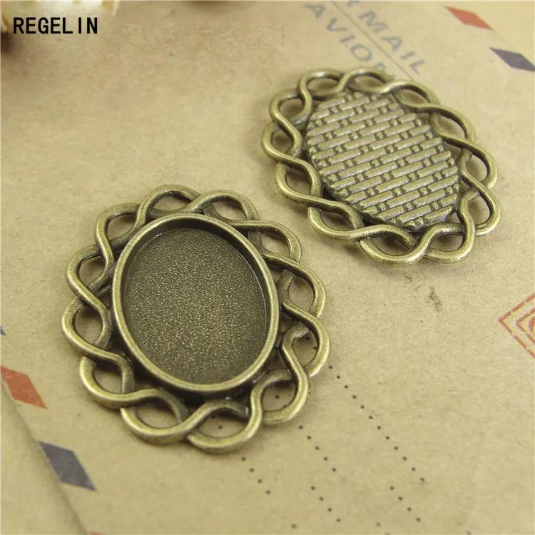 REGELIN High Qualtity 20pcs/lot Wholesale Jewelry Findings Alloy Antique Bronze Pendant Blank Vintage Tray 18*13 MM For DIY