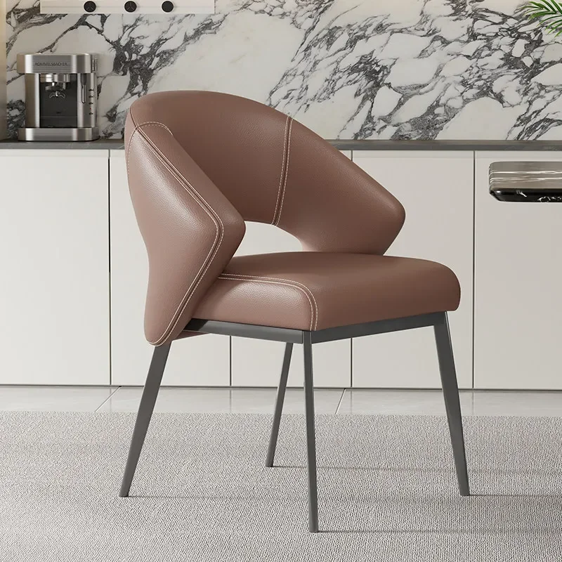 a Modern Luxury Leather Dining Chair Curved Hollow Backrest Stitched Detail Metal Legs For Dining Room Kitchen Decor