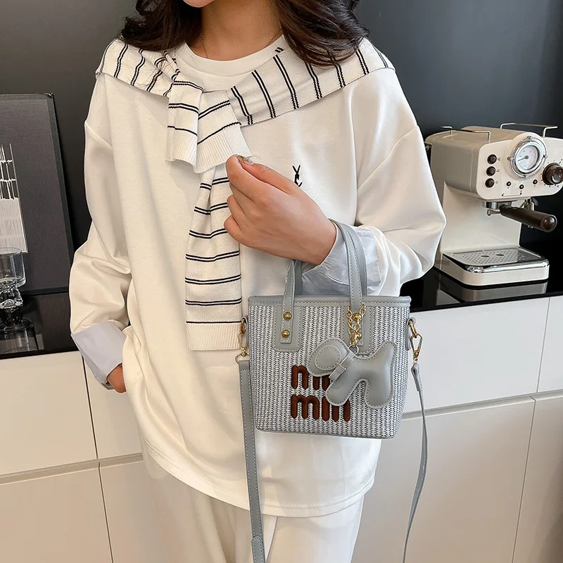 

Simple Trendy Chic Diaper Bag A Designer Solid Color Leather Crossbody Bag With Letter Logo For Luxury Women