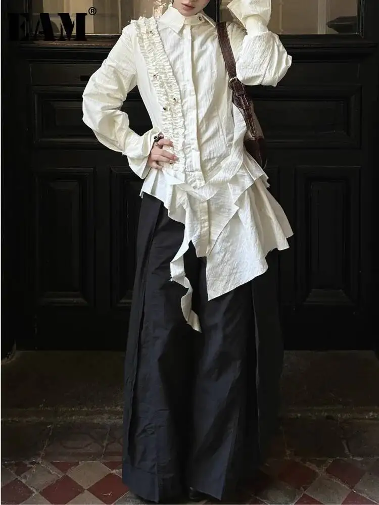 EAM Fashionable Solid Turn-Down Collar Ruffle Asymmetric Blouses Waist-Cinching Flare Long Sleeve Top 2026 Autumn New 31B0433