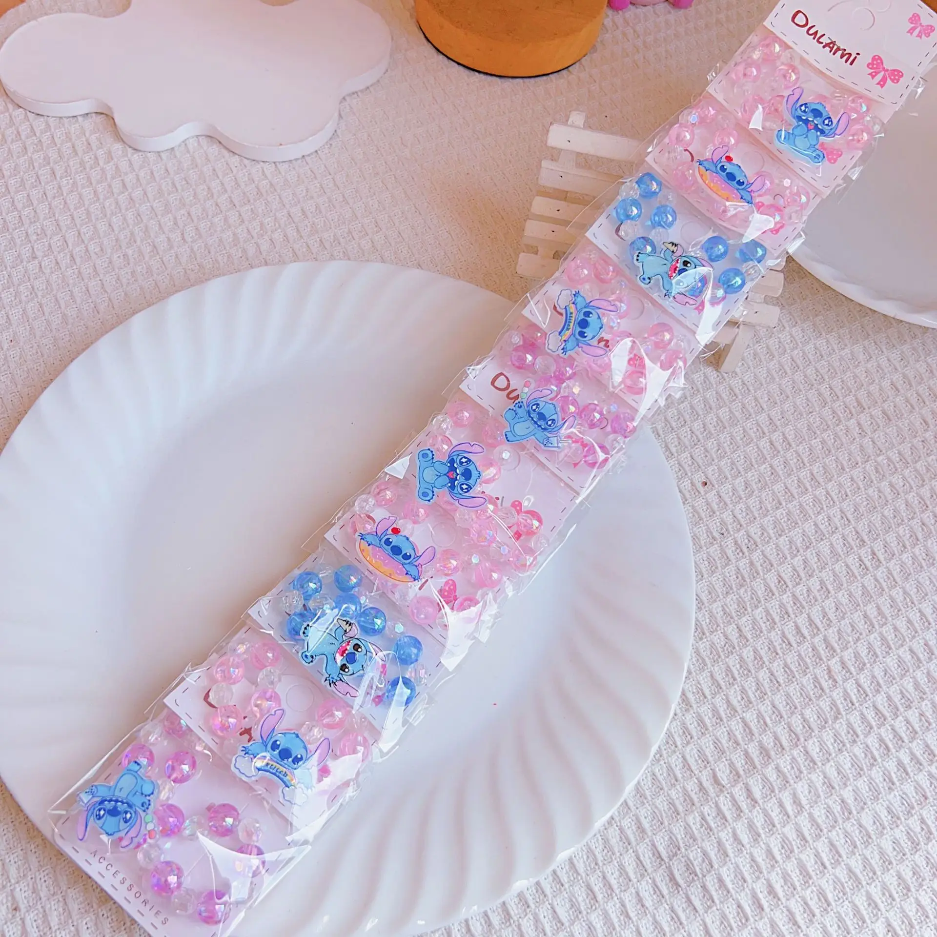 Accesorios para niña, juguete de regalo, muñeca Lilo & Stitch, lazo para el pelo, pulsera con cuentas, banda para el pelo de Stitch de Disney, regalo pequeño para fiesta infantil, venta al por mayor