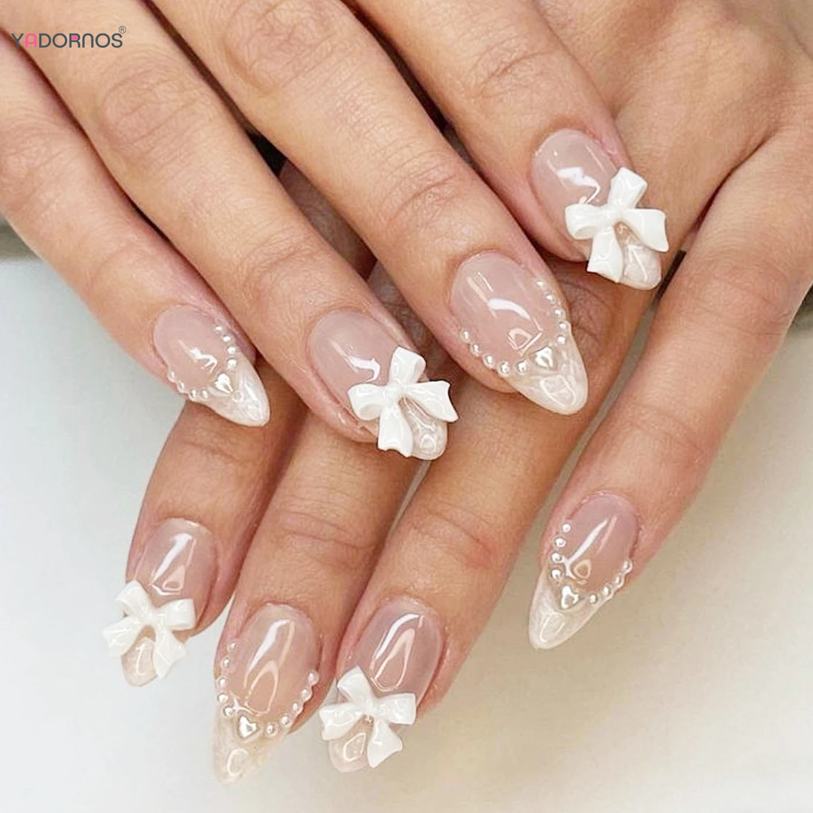 Uñas postizas de Color desnudo, puntas francesas blancas, prensa en las uñas, decoración de perlas con lazo 3D, uñas postizas suaves, dijes, manicura para mujeres