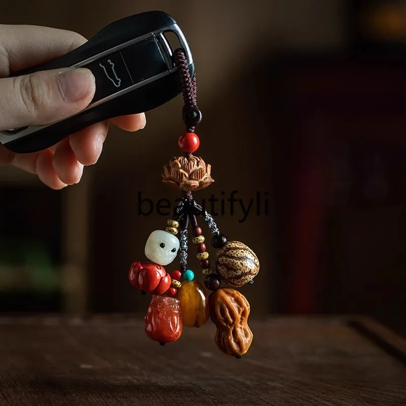 

Ping An Lotus Car Keychain Pendant Good things happen, high-end beeswax Pixiu Nanhong agate pendant