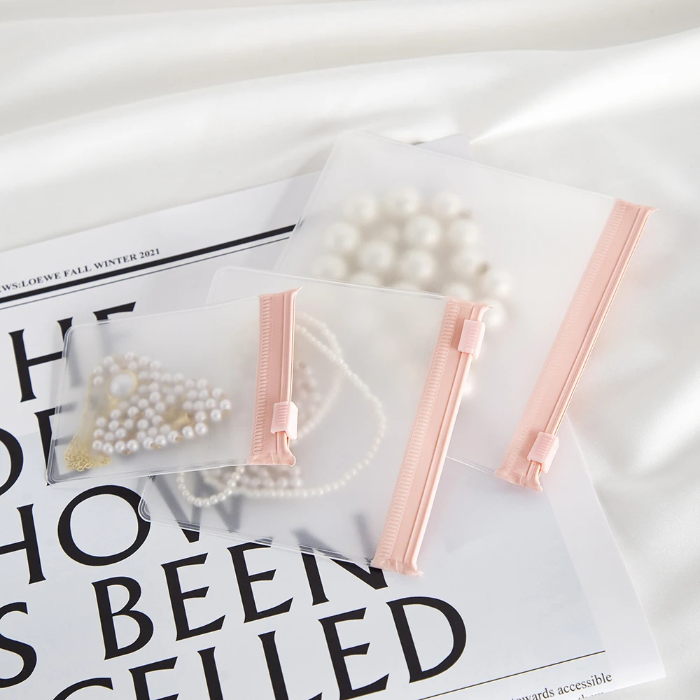 Bolsa con cremallera de joyería rosa personalizada, bolsa de sobre de almacenamiento de plástico EVA esmerilado, anillos, pendientes, colgante, collar, pulsera, embalaje