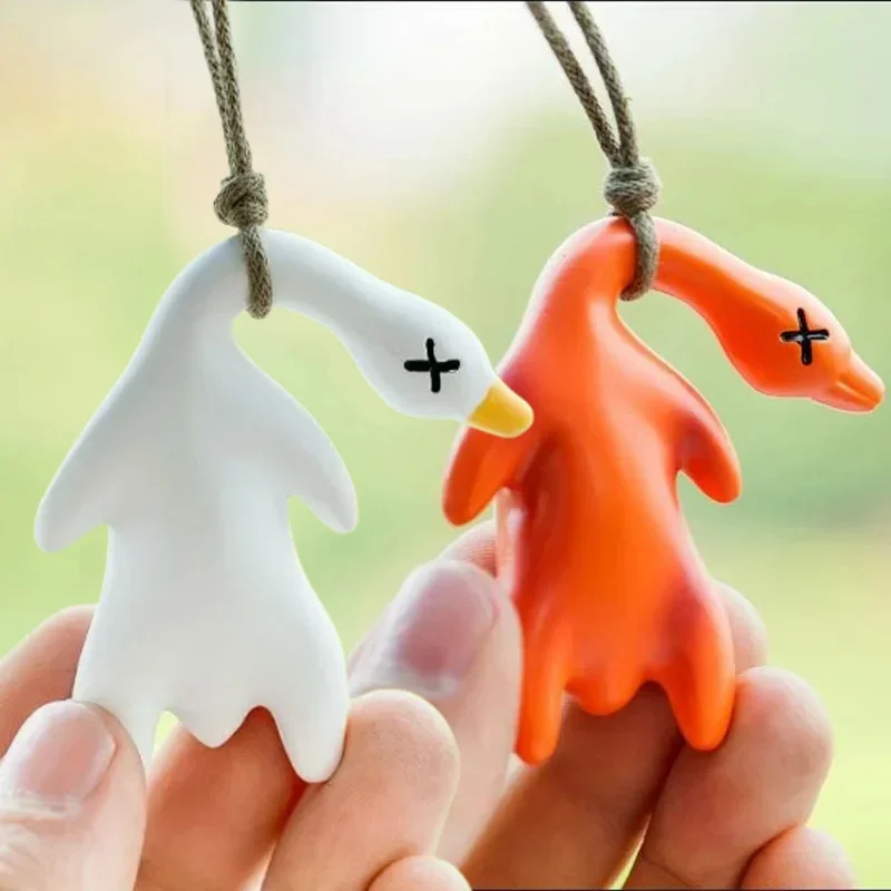 1/2pcs New Color Change Duck Keychain Fashion Funny Goose Pendants for Bag Car Keyrings Cute Cartoon UV Photochromic Key Chains image 4
