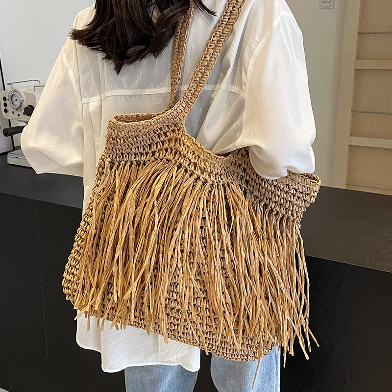 Hollow Out Tote Bags For Women Luxury Designer Handbag Purse New Weave Large Capacity Tassel Shoulder Straw Beach Bag