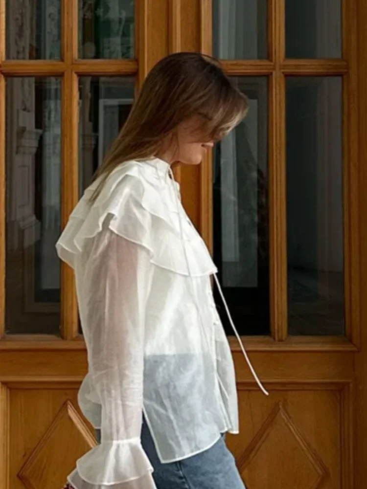 

Elegant White Lapel Ruffle Shirts Women Long Flared Sleeve Single Breasted Layered Loose Blouses 2026 New Commute Office Top