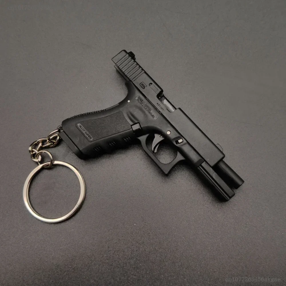 Shell ejector 1:3 gLoCK aleación Empire miniatura pistola de juguete llavero Jedi pistola de supervivencia modelo desmontable equipo de soldado para niño