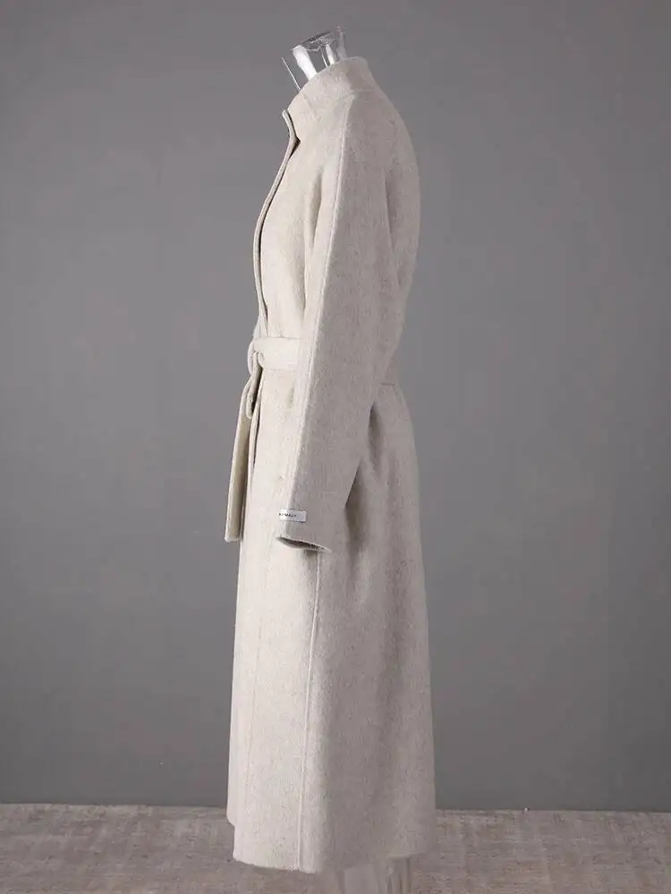 HUISONG Beige Belted Big Size Elegante Wollen Jas Nieuwe Stand Kraag Lange Mouw Vrouwen Jas Mode Tij Herfst Winter 2025