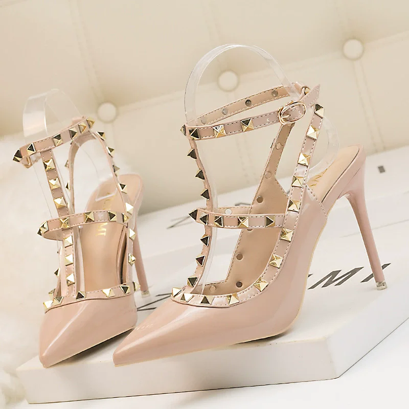 

Spring and summer new pointed shallow patent leather metal rivet single shoes banquet dress slender high-heeled women's sandals
