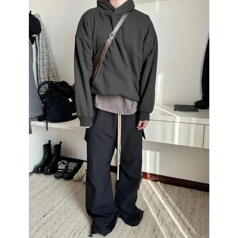 Luźne nylonowe spodnie robocze z kieszeniami Modne, młodzieżowe, jesienno-zimowe nowości w stylu high street, oddychające spodnie z prostymi nogawkami