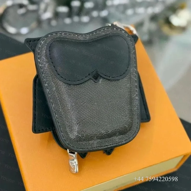 

Luxury Designer Keychain Leather Owl Bag Charm Men Womens Keychain Animal Bag CharmsLetter Key Chain earphones Pouch Bag