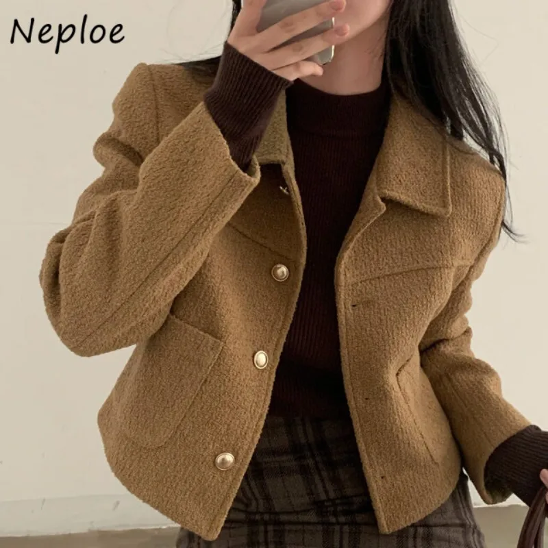 Neploe Francese Vintage Temperamento Tinta unita Risvolto Bottoni in metallo Cappotto di lana Femme 2025 Inverno Semplice ed elegante Giacca a maniche lunghe