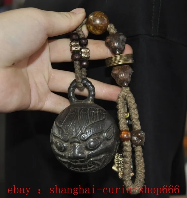 

Xizang Buddhist Temple Bronze Weird Head Exorcism Bell Statue -Natural materials