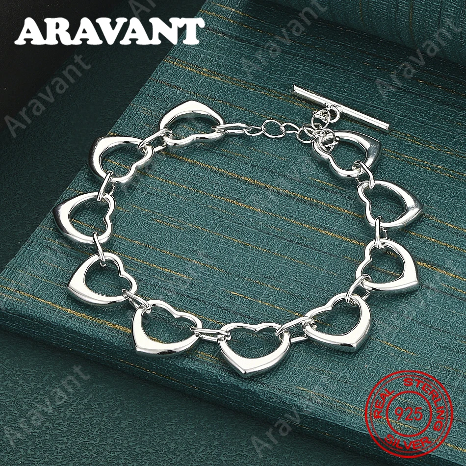 925 Sterling Silber Armband mit zehn herzförmigen Anhängern, ein zartes und elegantes Design für Damen-Verlobungsschmuck.