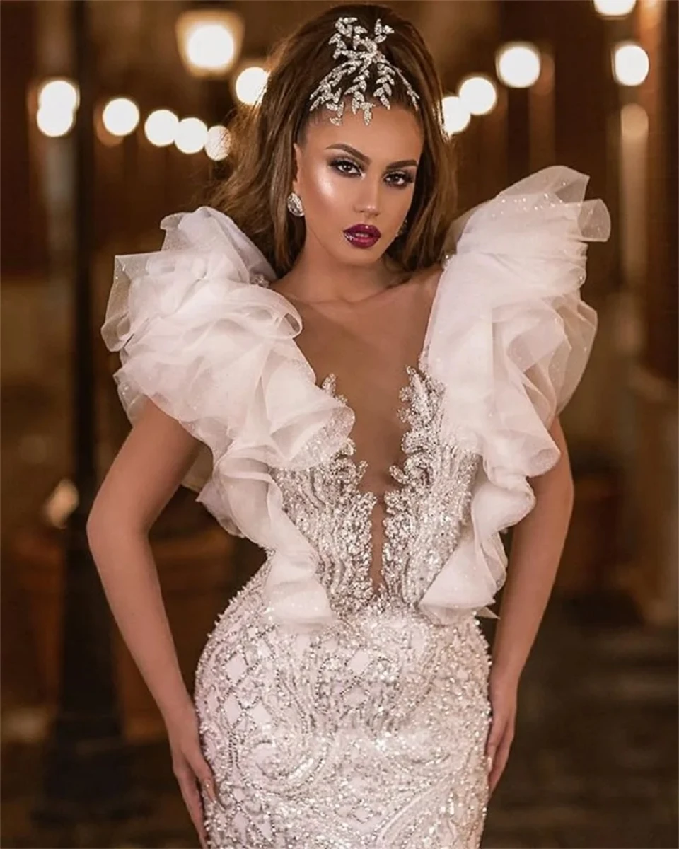 Sexy Deep V-Neck Sleeveless Backless Appliques Sequined Button CRYSTAL Wedding Dress Tulle Mermaid 2024 Court Train  Bridal Gown