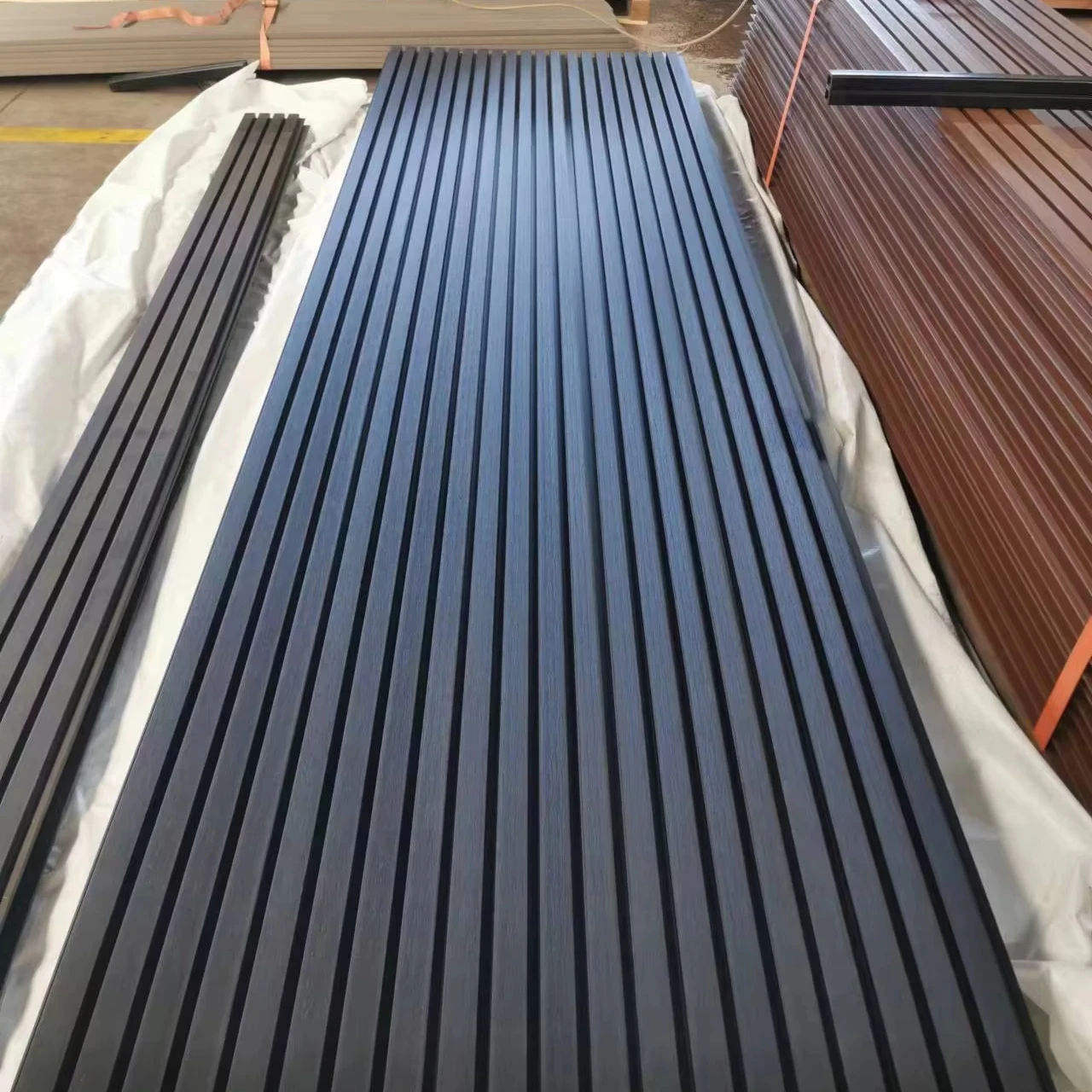 2026 Outdoor & Interior Waterproof WPC PVC Wall Panel with 3D Wood Grain Fluted Surface Fireproof Cladding for Hotel Usepromote