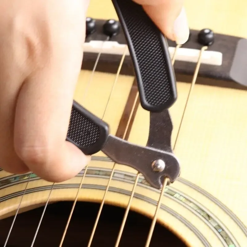 

Guitar String Changing Tool 3 in 1 Guitar Winder String Winder String Cutter