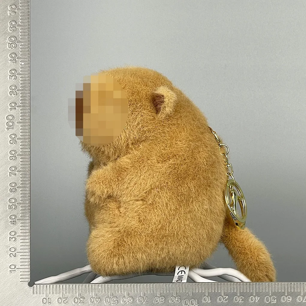New style Capybara, a small animal that wags its tail. A pull-string toy that rotates and makes squeaking sounds HOT
