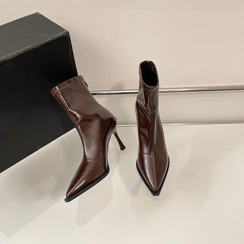 Autumn and winter new slim heel pointed leather boots simple solid color back zipper short boots for women