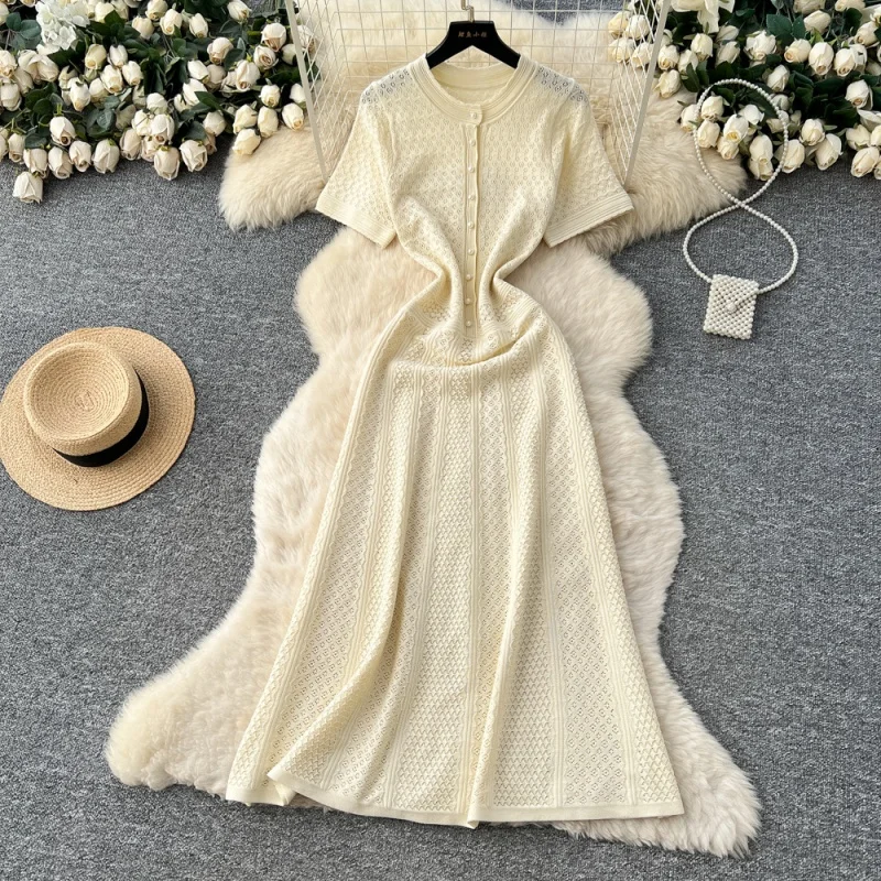 Elegante uitgeholde gebreide jurk zomerkleding dames 2026 korte mouw O-hals slanke lange jurken Franse stijl brei jurk