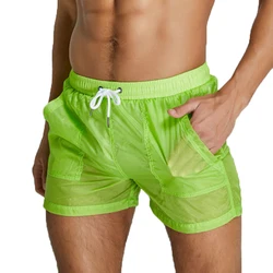 Bañadores cortos de secado rápido para hombre, traje de baño fino transparente con bolsillo informal, pantalones de entrenamiento para gimnasio, Surf, Playa