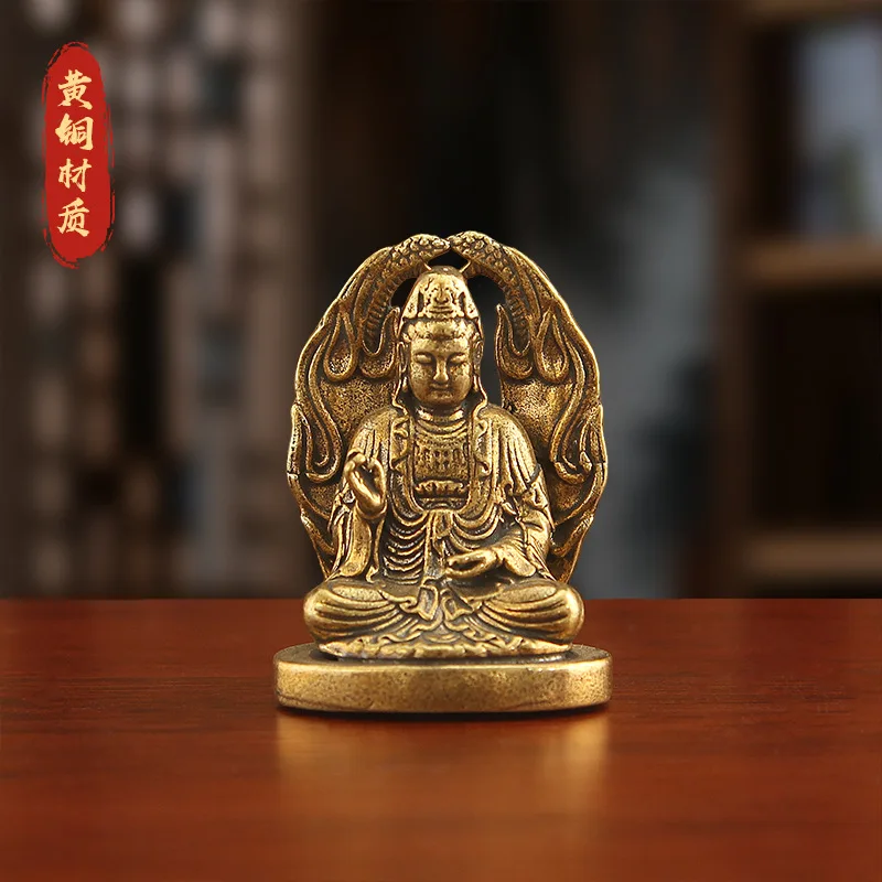 Brass Bodhisattva statue, depicting Guanyin in a meditative pose, with a snake-shaped pedestal and lotus flower ornament