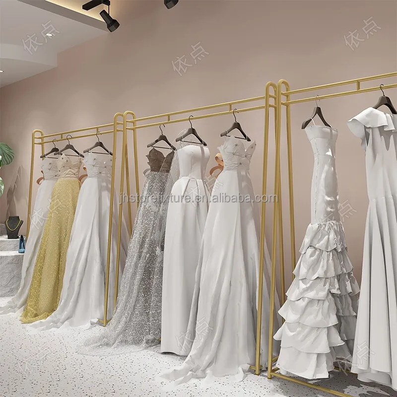 

Women Apparel Retail Store Design Metal Shinny Gold Floor Mounted Wedding Display Rack Gold Clothing Display