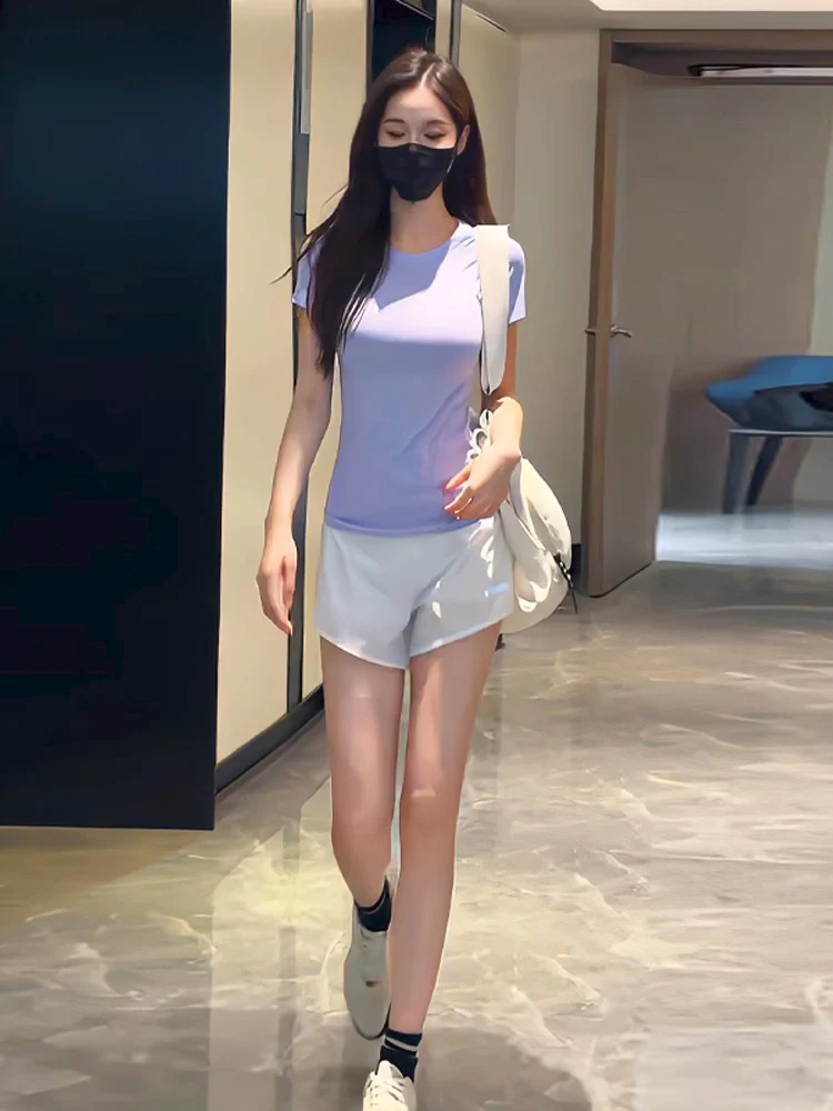 2025年フィットネスファッションスポーツウェアラウンドネックセーターとパンツのセット、スリムで若々しい印象の女性用カジュアルウェア