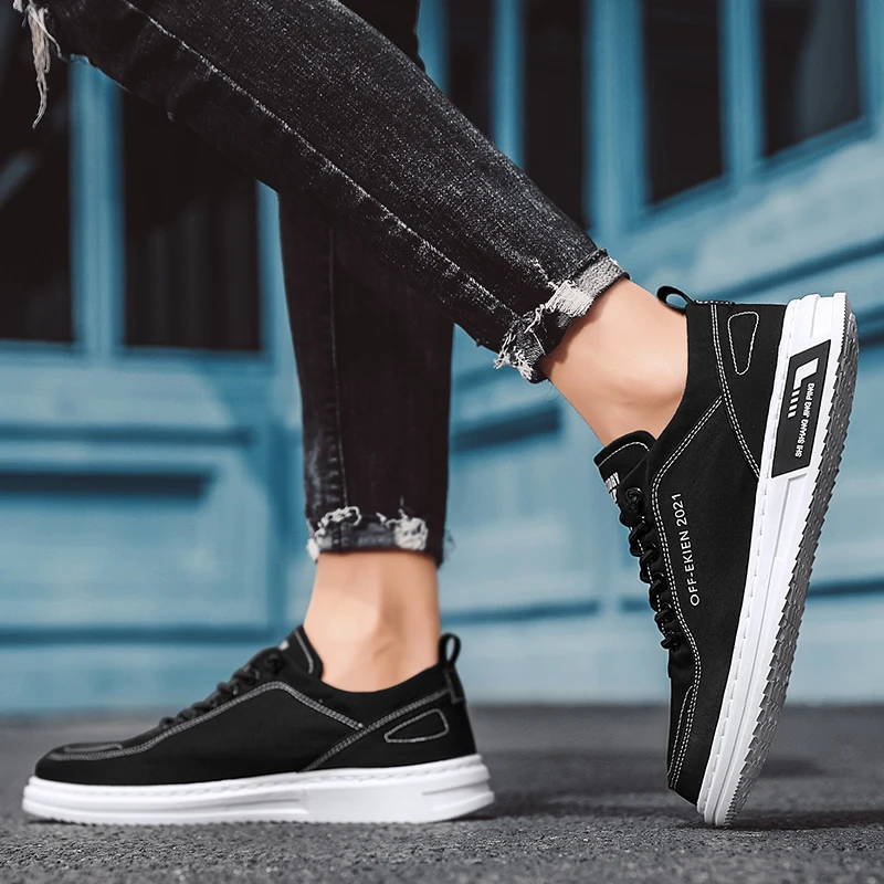 حذاء قماش الرجال أحذية رياضية عادية تنفس المشي الشقق الدانتيل متابعة سكيت المدربين موضة خفيفة الوزن رجل أحذية مفلكنة