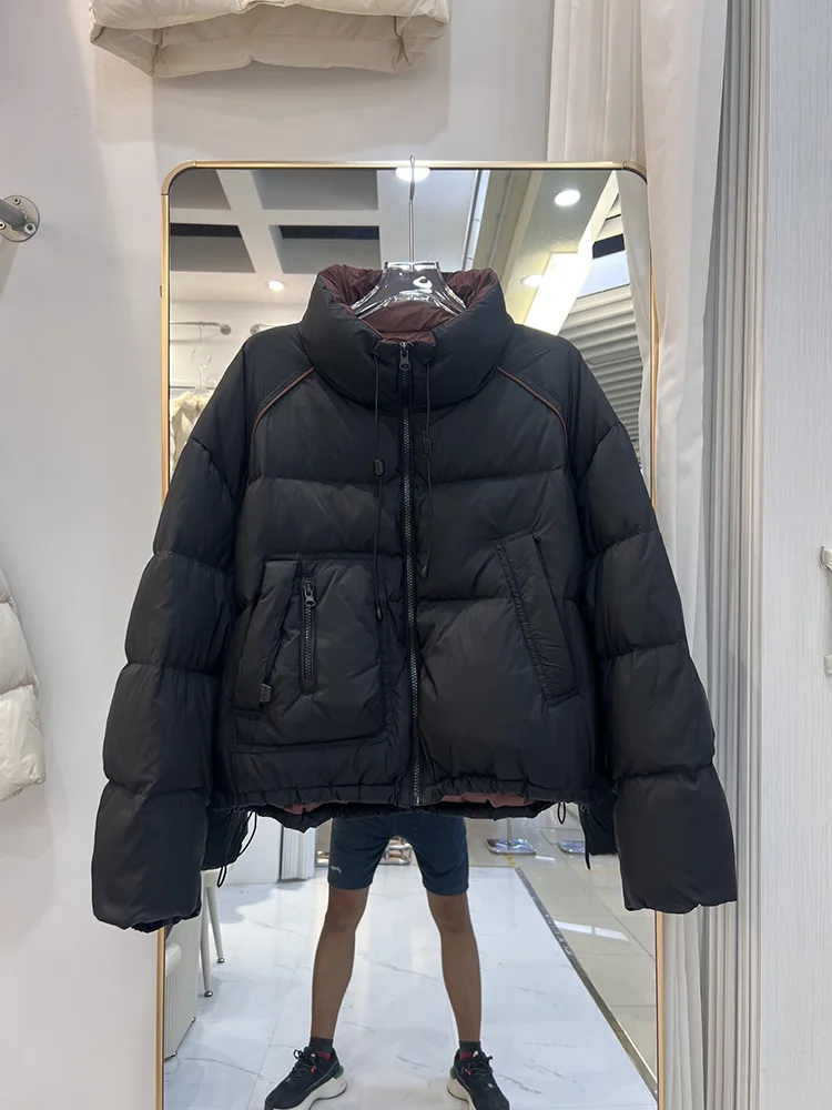 سترة شتوية جديدة بسيطة للنساء بنمط قصير النسخة الكورية بياقة واقفة ورباط غير متماثل معطف أسفل البط