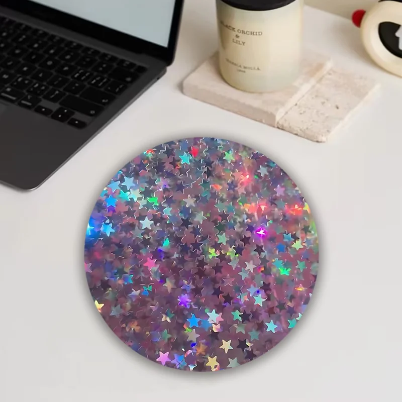 

The shiny star-shaped round mouse pad with an anti-slip rubber base is a high-quality office and home computer desk mat