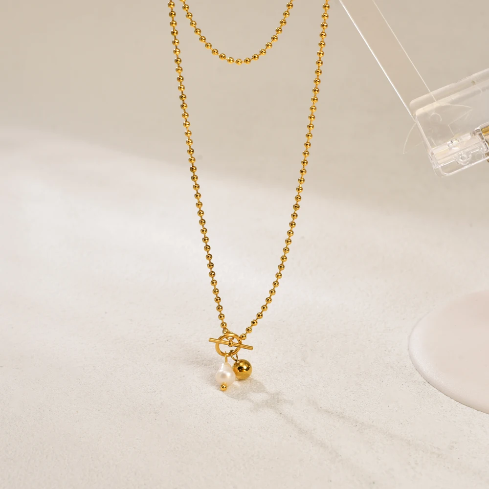 L42 versión coreana OT cierre collar con colgante de perlas de agua dulce, joyería de acero inoxidable de estilo frío dorado para mujer