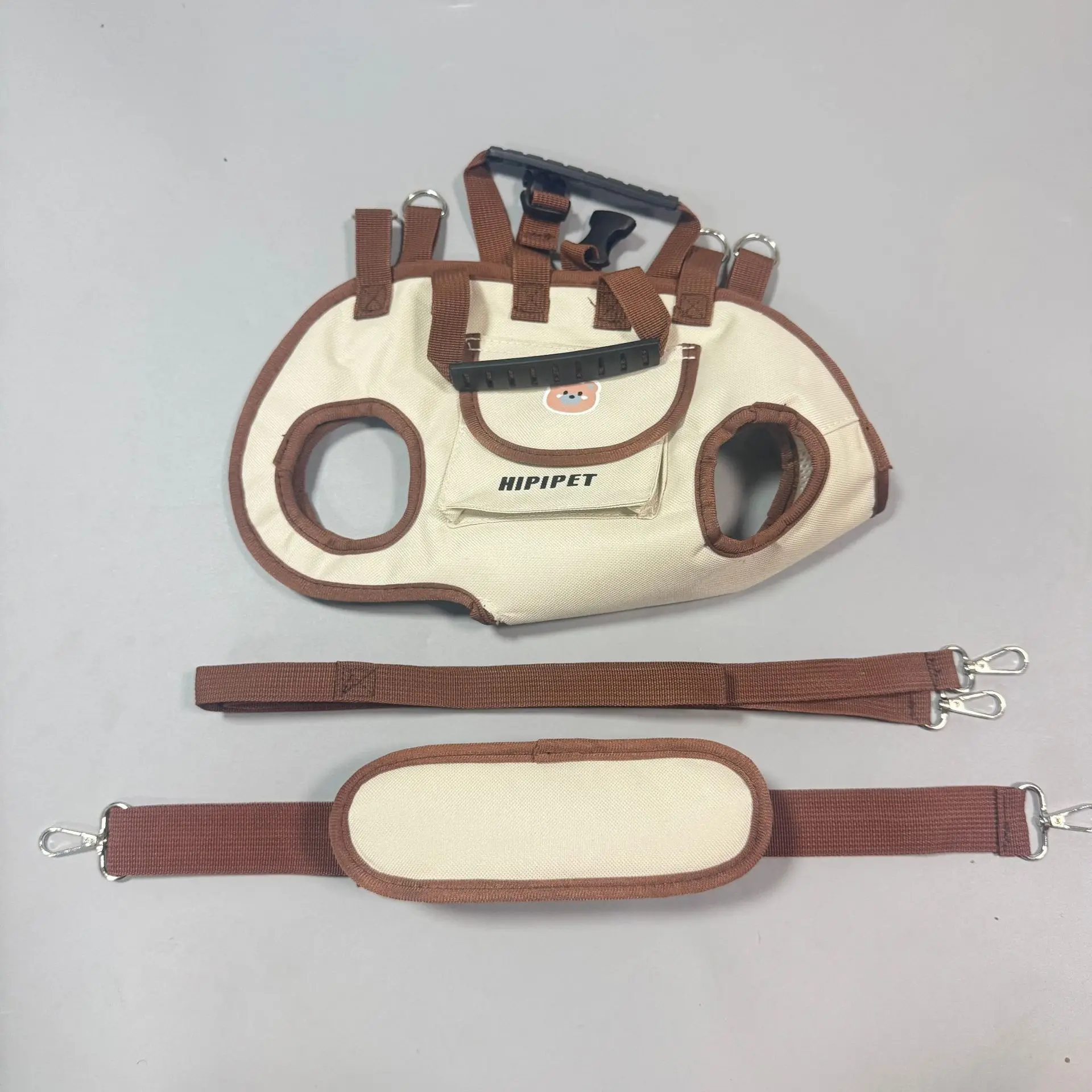 حقيبة ظهر أفقية محمولة للكلاب مع حزام كروس قابل للتنفس ومقبض كتف واحد حقيبة زعيم الحيوانات الأليفة للسفر المريح