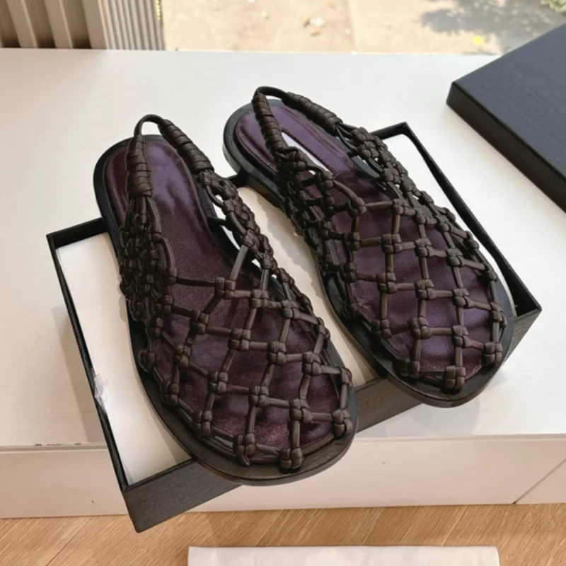 

French Luxury Designer Brand Woven Hollow Roman Sandals With Retro Flat Bottom Leather Fishing Net Beach Toe Cap Sandals