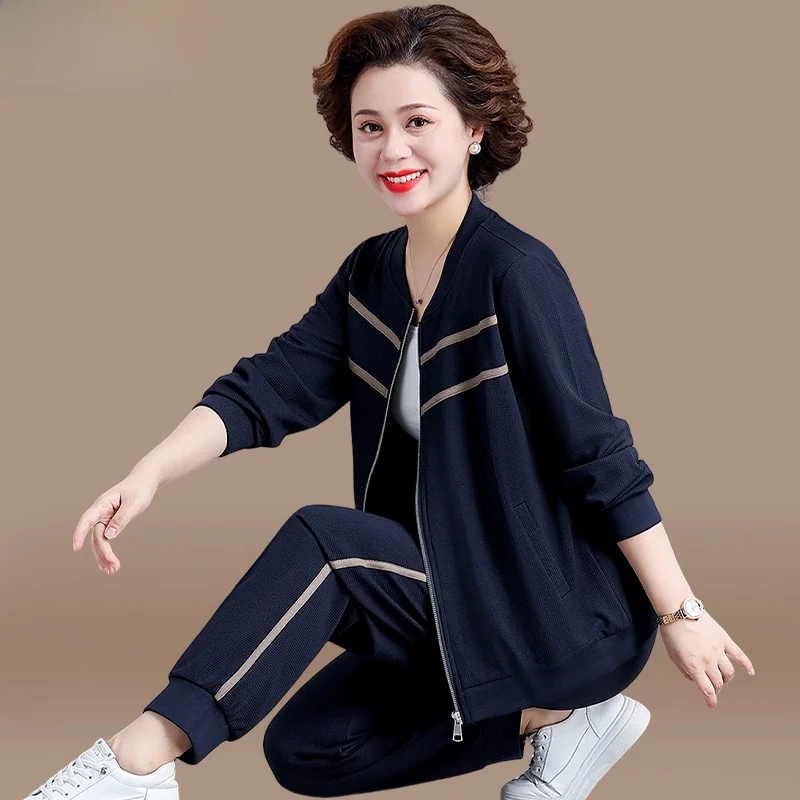 

Повседневный спортивный костюм для мам: осенний модный тонкий комплект для женщин среднего возраста, состоящий из двух предметов, с длинными брюками, V-образным вырезом и молнией, стандартный крой.