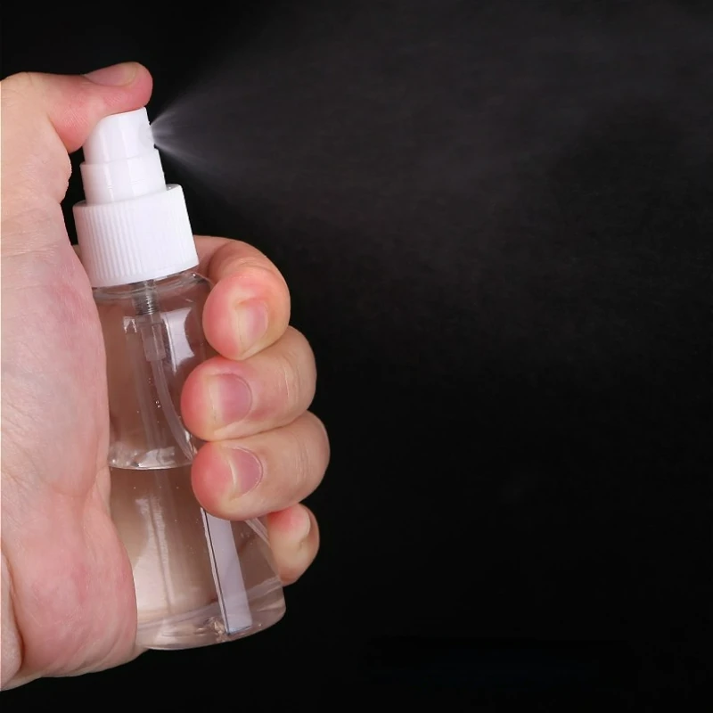 NWE Travel dispenser bottle transparent cosmetic perfume alcohol portable plastic pressed small spray bottle sterilization