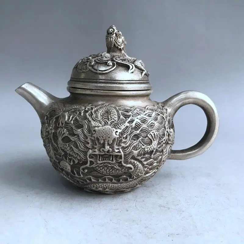 

China Antiques Tibetan silver hand-carved Chinese Zodiac dragon teapot wine pot