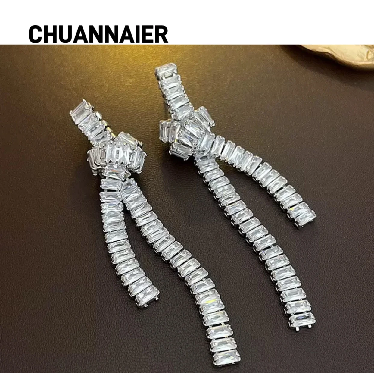 

Popular zircon knotting tassel earrings, luxurious European and American long exaggerated cold wind earrings, new earring