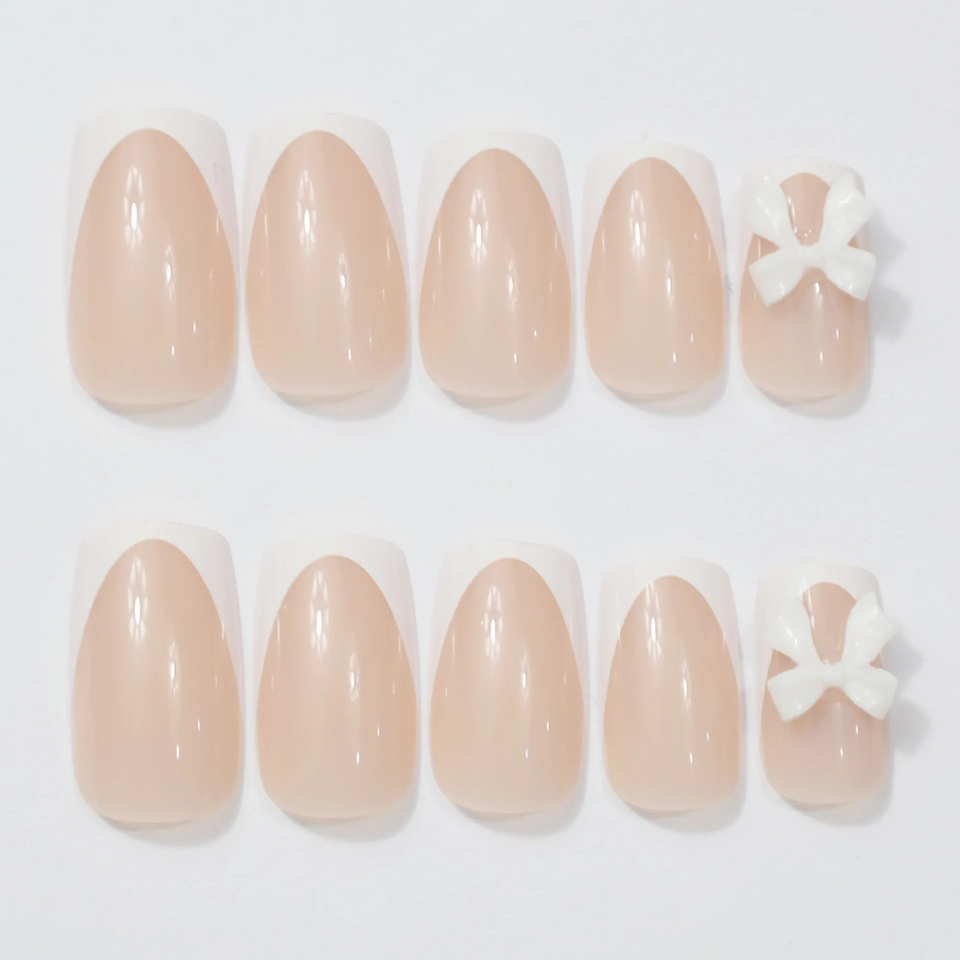 

2026 New Simple Nail Art: Sweet White French Bow Nail Art - Brightens Skin and Elegant Medium-Length Wearable Nails