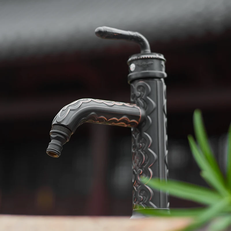 

Chinese style courtyard outdoor black carved cold and hot faucet, outdoor stone basin, water pool, all copper anti freezing