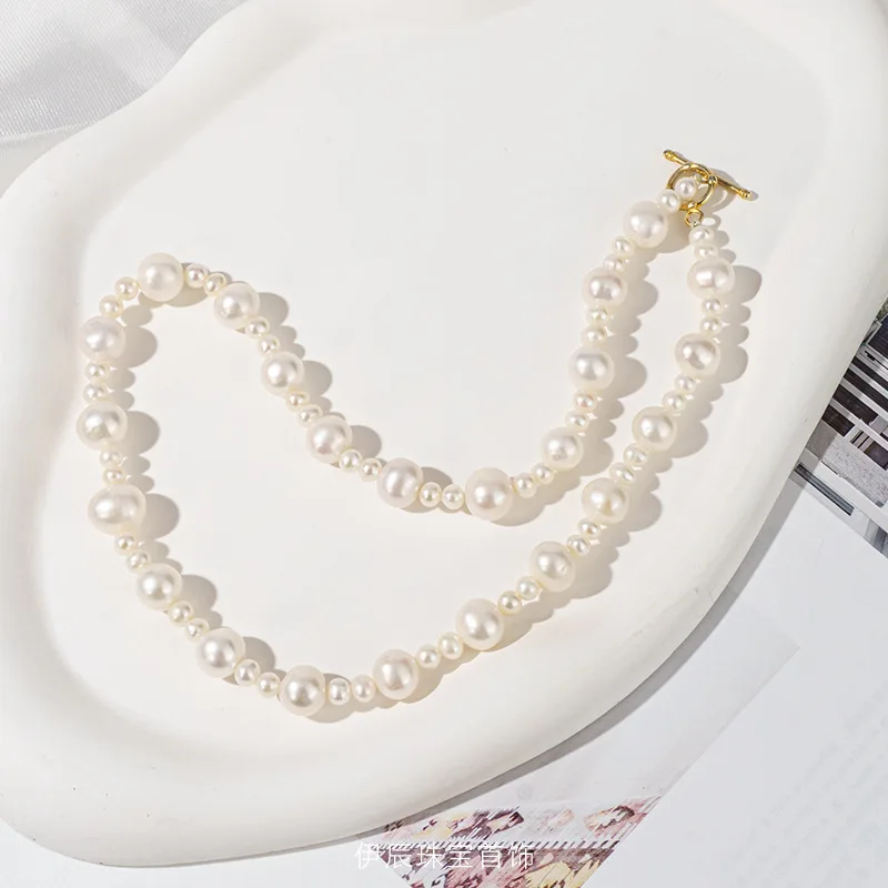 

Круглое пресноводное ожерелье с жемчугом размера OT