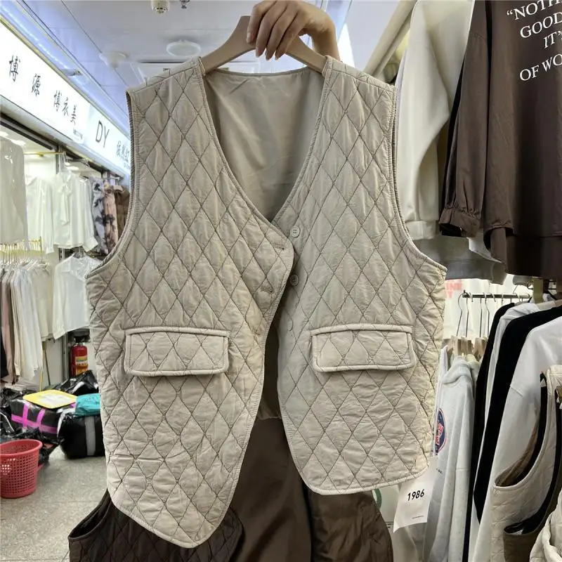 

Spring and Autumn New Women's V-neck Cotton Vest Sleeveless Retro Casual Top Irregular Coat