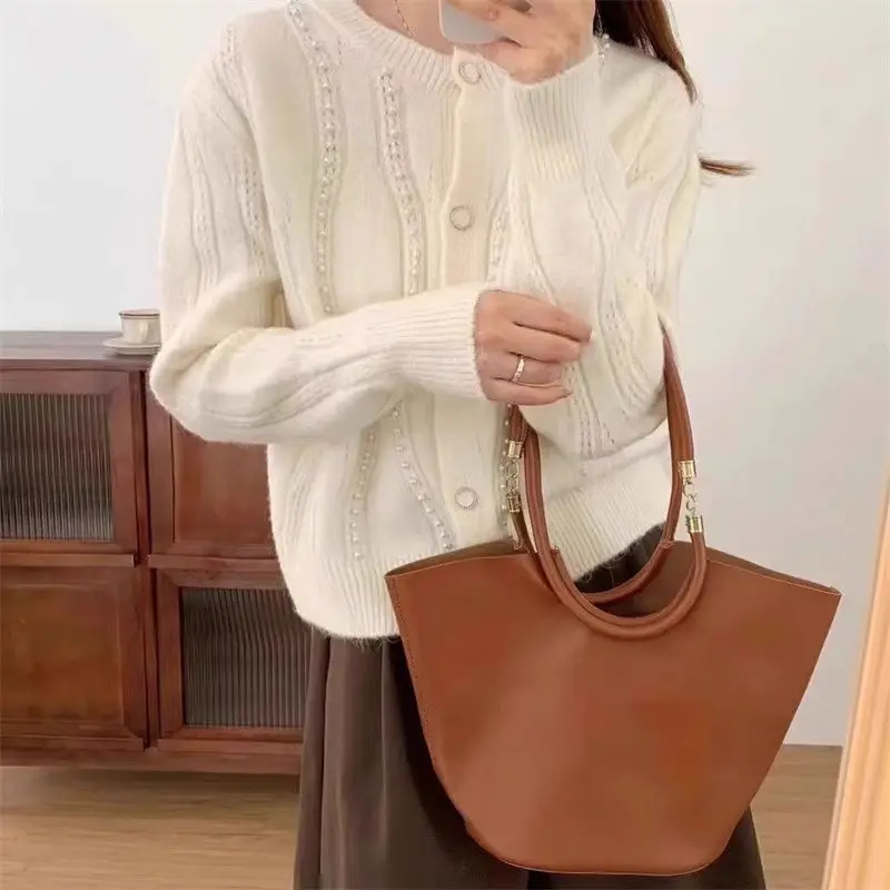 

Высококачественный женский вязаный свитер, кардиган без катышков, ранняя осень 2023, новинка Sle Dongguan Daliang, зимняя мода, женский нож...