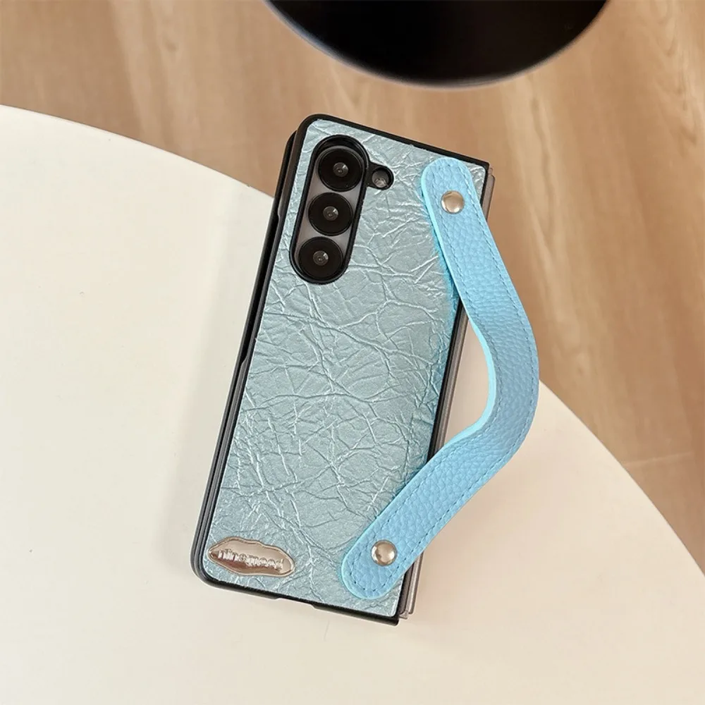 

Однотонный текстурированный чехол из искусственной кожи для Samsung Galaxy ZFold7 ZFold6 5 4 3, чехол для мобильного телефона с браслетом для женщин