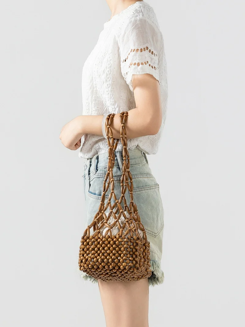 2026 Women Woven Hand Bag Exquisite Design Hollow-out Wooden Bead Tote Bucket Shoulder Bag Female Handmade Beaded Handbag