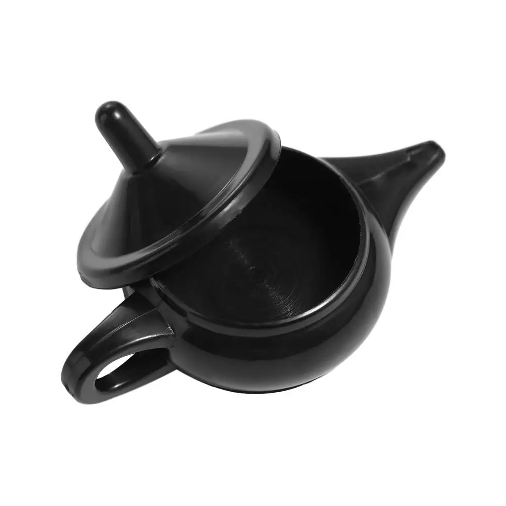 Transferencia de monedas increíble tetera divertida juego divertido Primer plano magia Aladdin genio ligero plástico fresco