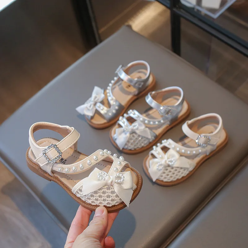 

Новые детские летние сандалии с бантом, элегантные туфли для девочек, дышащие сетчатые сандалии для улицы, повседневные пляжные сандалии для детей