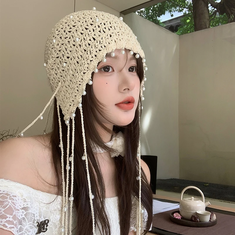 

Korean Hollow Pearl Pendant Handmade Crocheted Pullover Hat Women Ethnic Style Spring and Autumn Ear Protection Beanie Hats