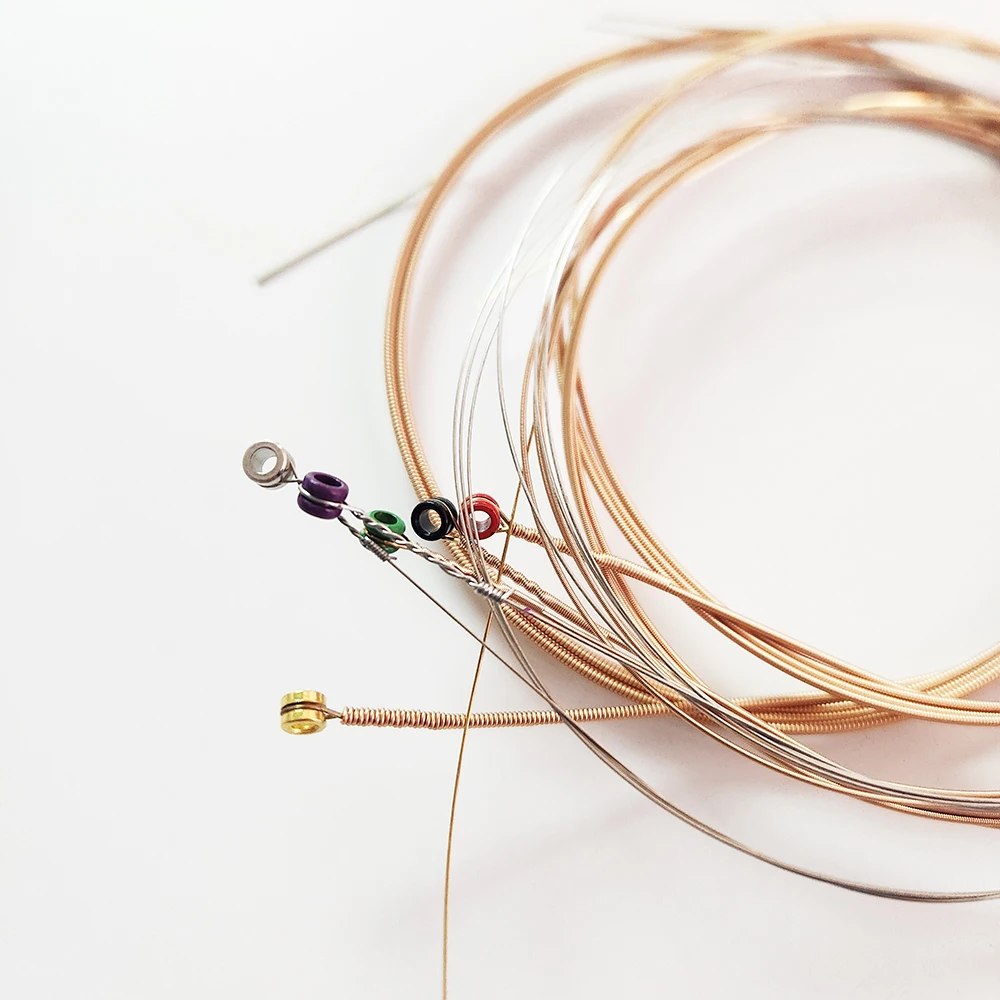 حزمة كبيرة (1000 مجموعة) أوتار جيتار صوتي من البرونز الفوسفور الفاخر، مقاس 1253، مطلية بالنانو لمتانة معززة